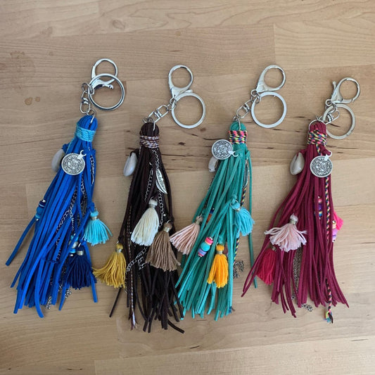 Bijou de sac et porte-clés en lacets de cuir